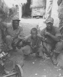 "Two American soldiers with a North Korean prisoner of war, 5 August 1950 (National Archives) " Source: The Korean War-The Outbreak: 27 June-15 September 1950, US Army Center of Military History. http://www.history.army.mil/brochures/KW-Outbreak/outbreak.htm