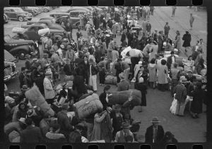 "Los Angeles, California. The evacuation of the Japanese-Americans from West Coast areas under U.S. Army war emergency order. Japanese-Americans with their baggage waiting for trains which will take them to Owens Valley""