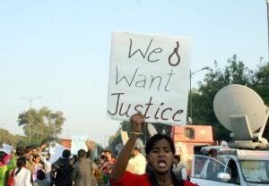 A-protestor-in-New-Delhi-We-Want-Justice