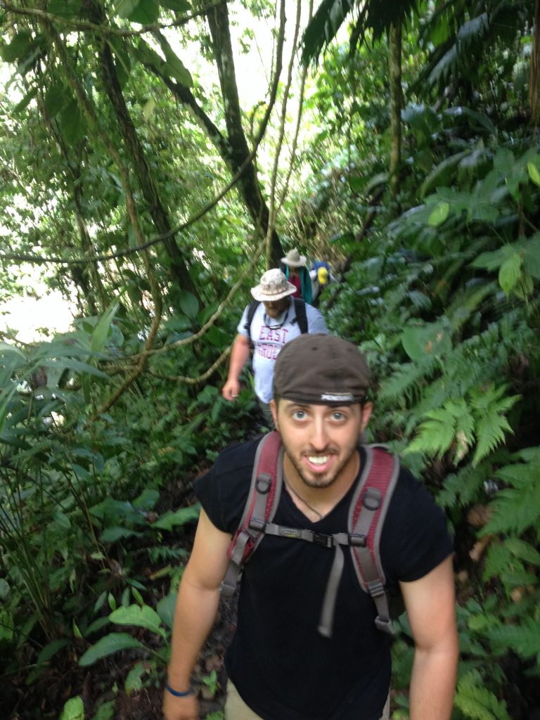 Crew chief, Borrelli, hikes through the rain forest to get to a waterfall