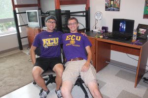 Roommates Kevin Nguyen and Cameron Worthington finish unpacking in their new home! 