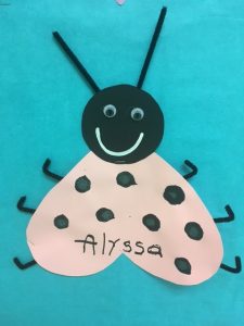 Picture shows Alyssa's Glyph - which is pink, has straight antennaes, bent legs, little eyes, and 8 spots.